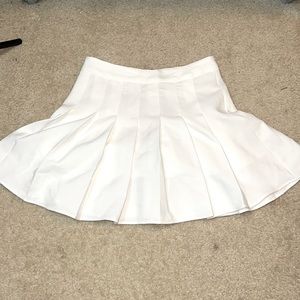 White tennis skirt.